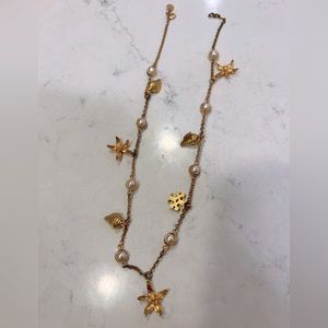 tory burch flower, sea shell & logo gold charm necklace